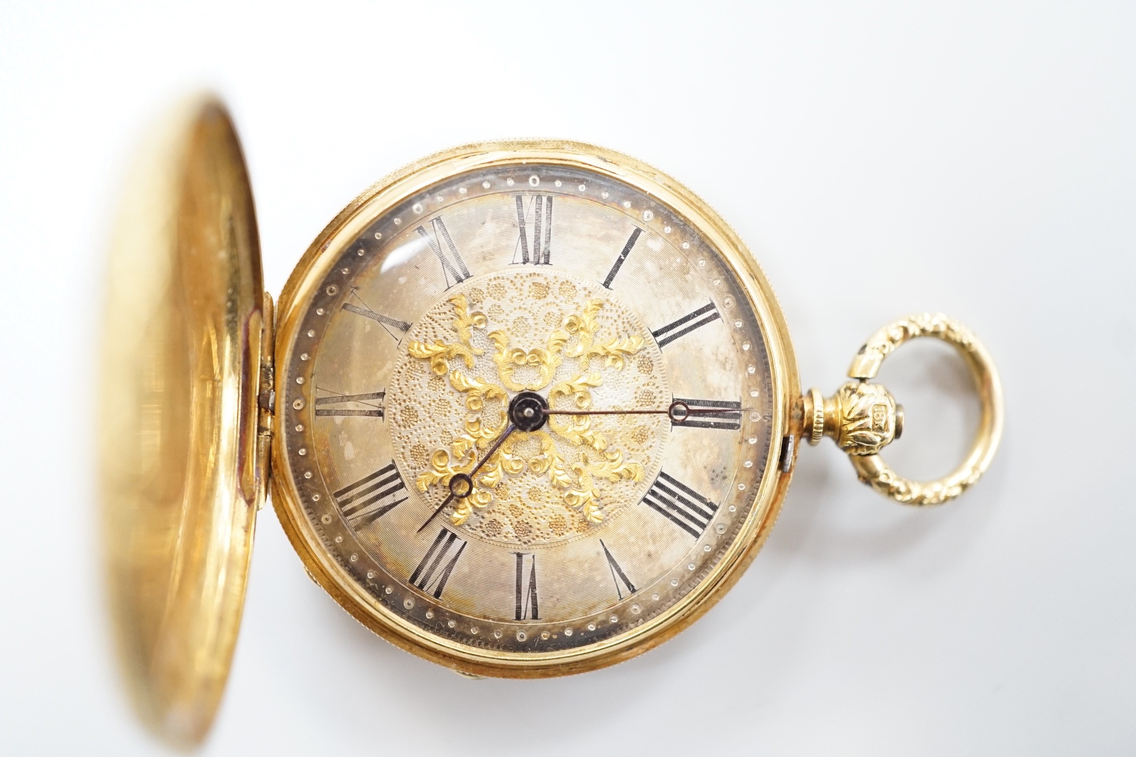 An early 20th century Swiss 18k and enamelled fob watch, decorated with the bust of a young girl and flowers verso, case diameter 33mm, gross weight 27.3 grams.